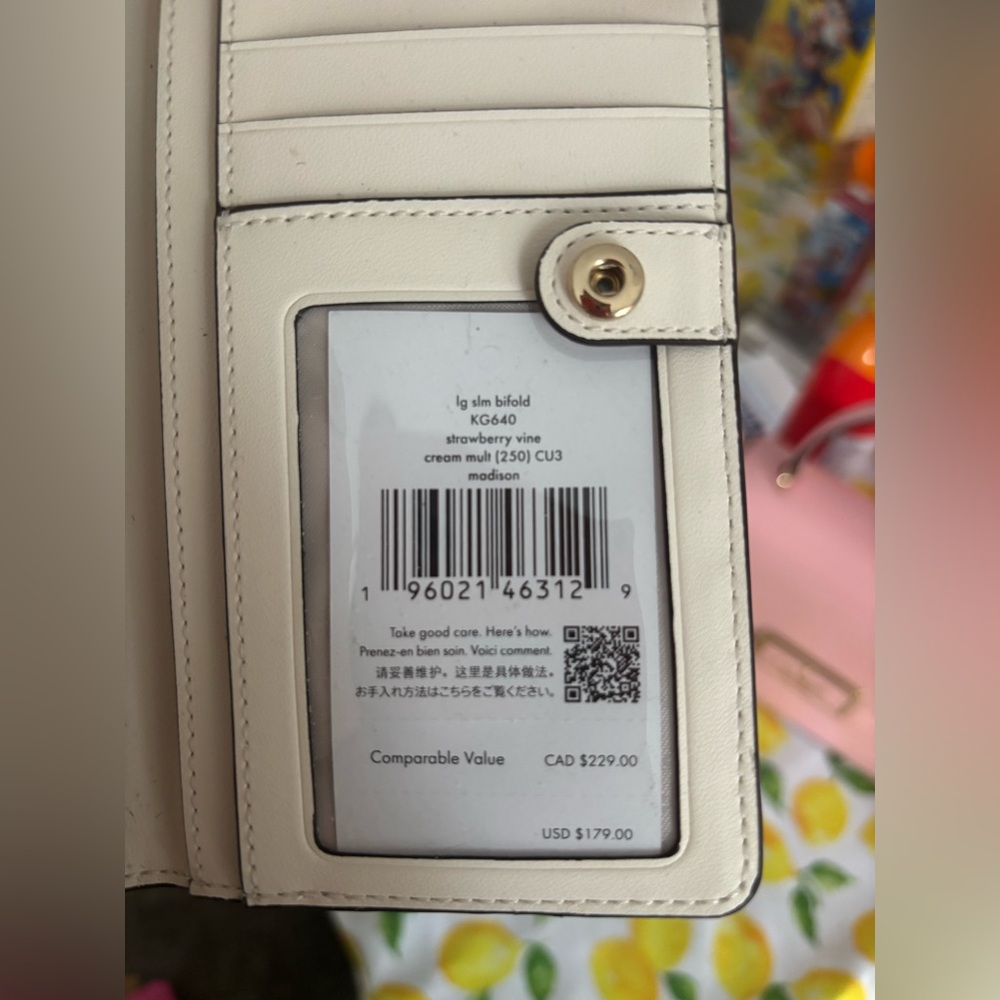 Strawberry vine Kate Spade Cream and Red Wallet Chic and Functional